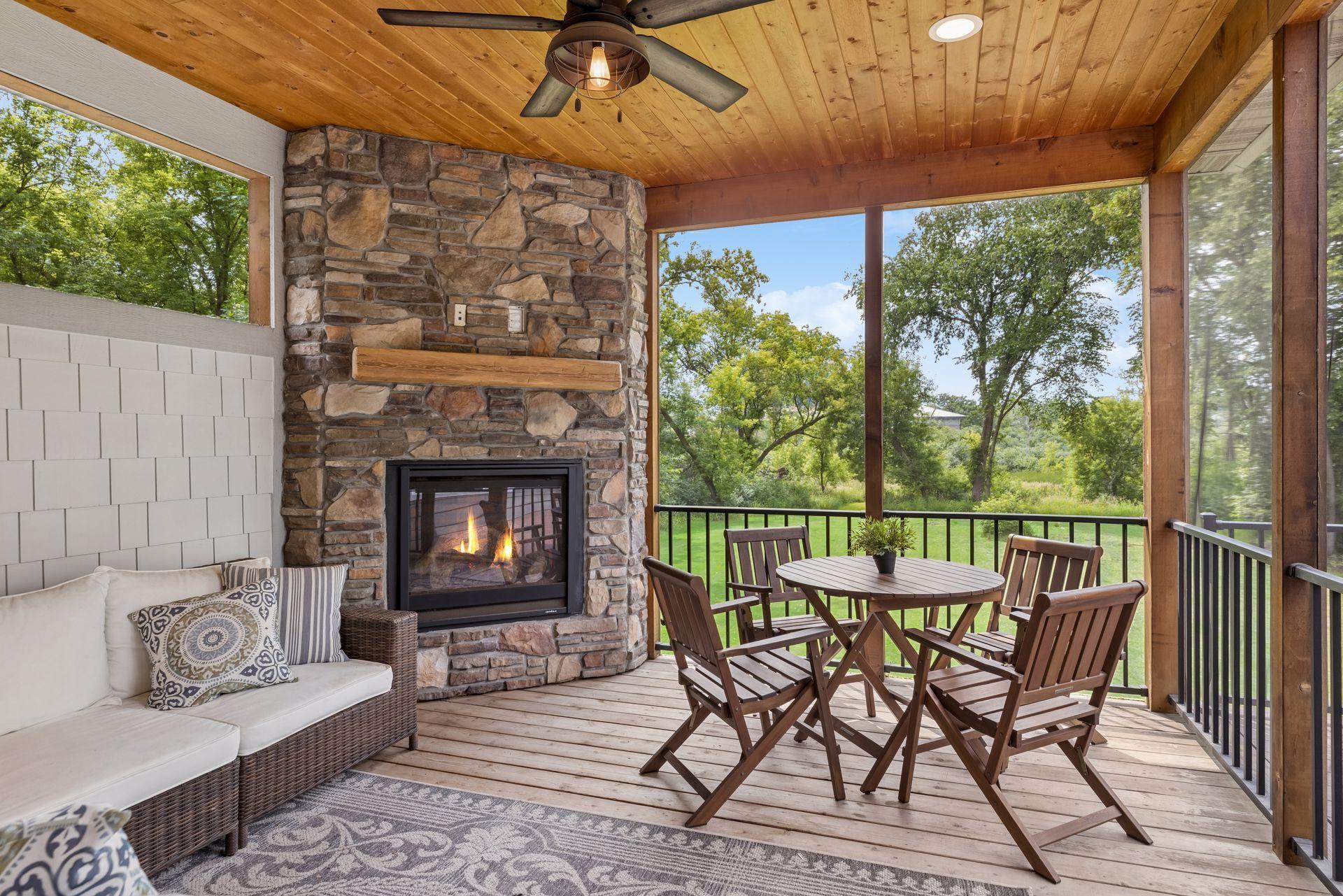 Lovely screened porch with fireplace