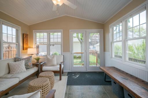 The sunroom lives up to every promise: - vaulted ceiling - walls of windows - French doors to the deck - a cozy built-in window seat makes this room buyers fall in love with instantly.