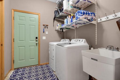Convenient main-level laundry room adds everyday functionality.