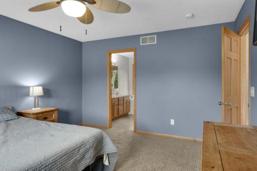 View from the primary bedroom to the private primary bath-