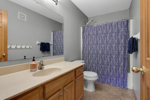 Full bathroom conveniently serving the upper-level bedrooms.