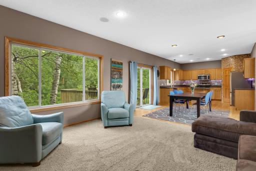 Open-concept layout connects the living room to the kitchen and dining area.