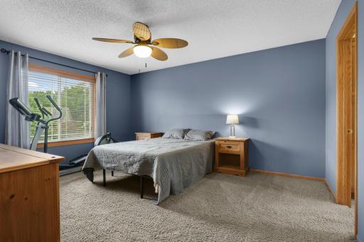 Spacious primary suite offering comfort and privacy.