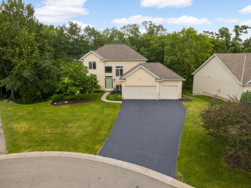 Welcome Home â Beautiful 2-story walk-out on a quiet cul-de-sac surrounded by mature trees.
