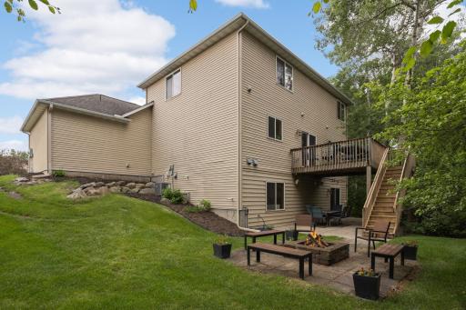 Enjoy outdoor dining and peaceful views from the deck.