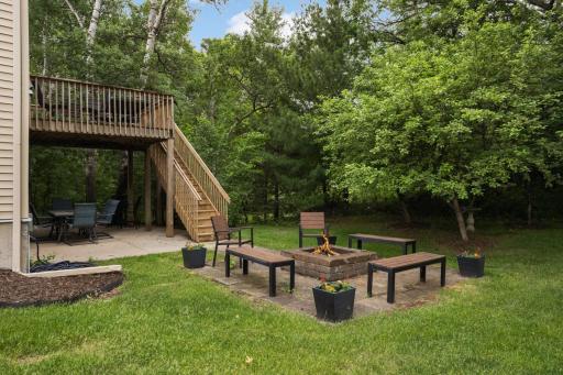 Mature trees provide privacy and a peaceful outdoor setting.