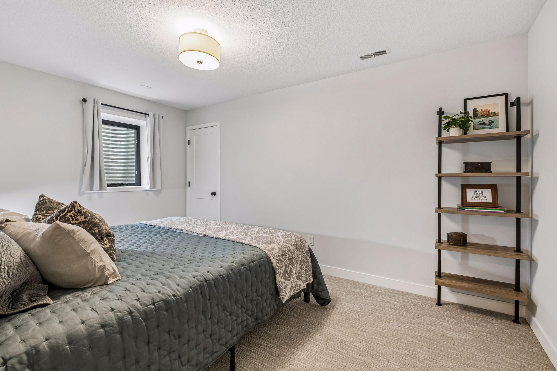 Lower level bedroom with large walk in closet