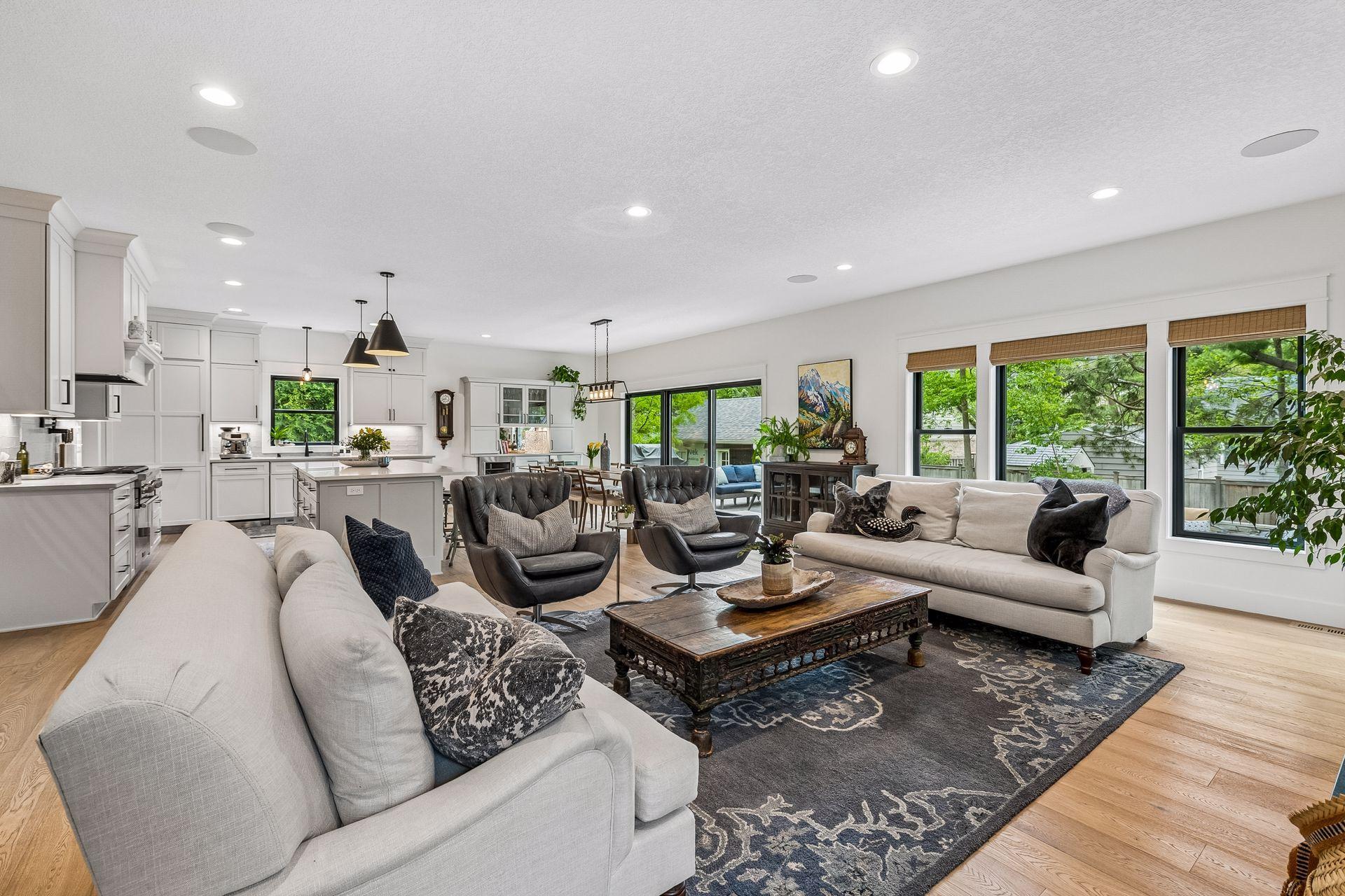 Spacious living area flows into kitchen and dining area