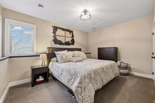 The lower level boasts 9' ceilings and lots of windows creating open and airy spaces.