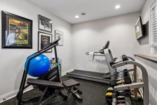 The Fourth Bedroom is currently used as an Exercise Room with rubber gym flooring and a closet.
