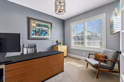 Tucked away behind a set of french doors is the main level Home Office - perfect for working from home.