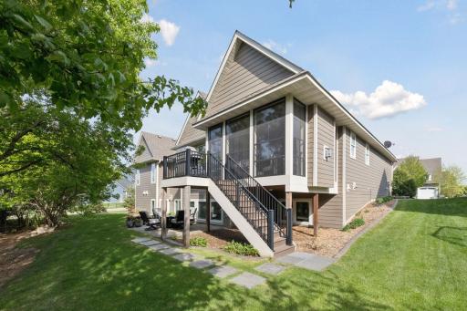 Set against a backdrop of towering trees and steps from the Fox Woods Preserve, this home enjoys a quite and peaceful setting.