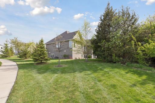 The large and level yard offers plenty of room for a game of kickball!