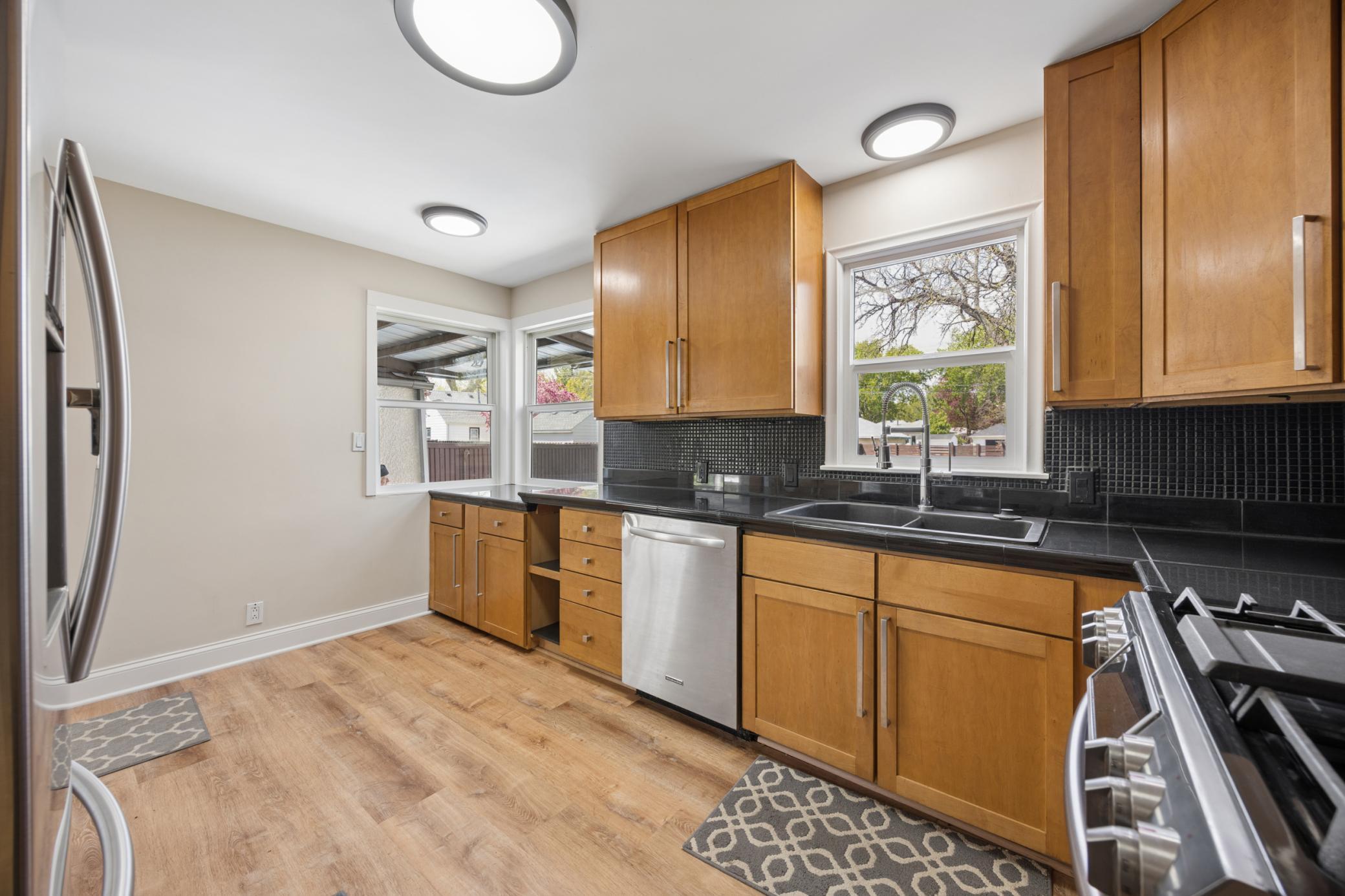 Updated appliances, flooring & lights