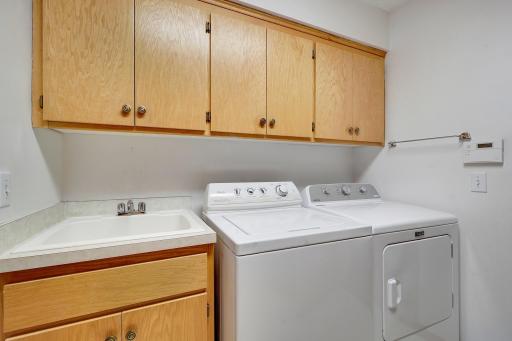 All the extra cabinetry in laundry area is convenient.
