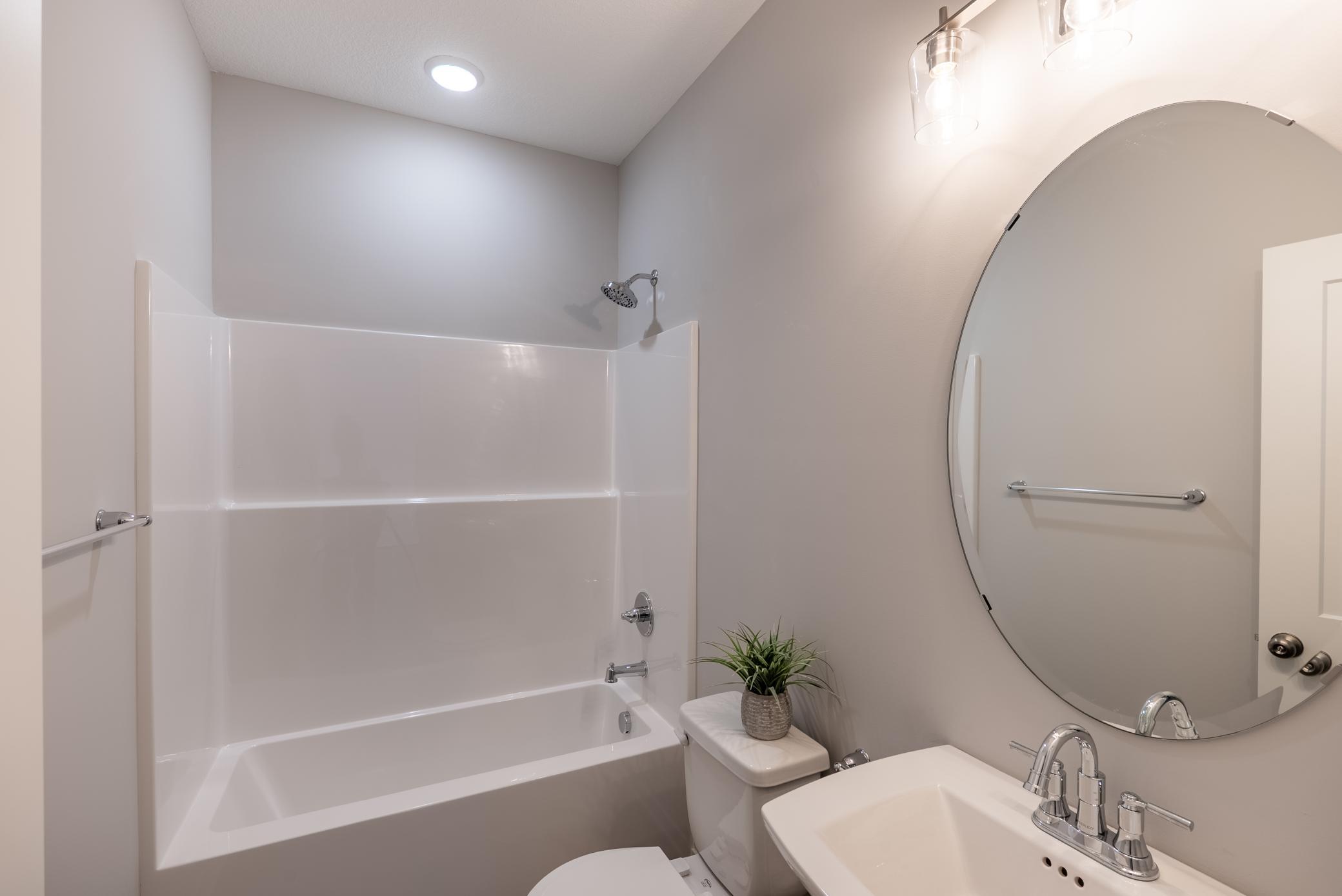 9117 62nd Street is under construction. These are photos of another model with the same floorplan.