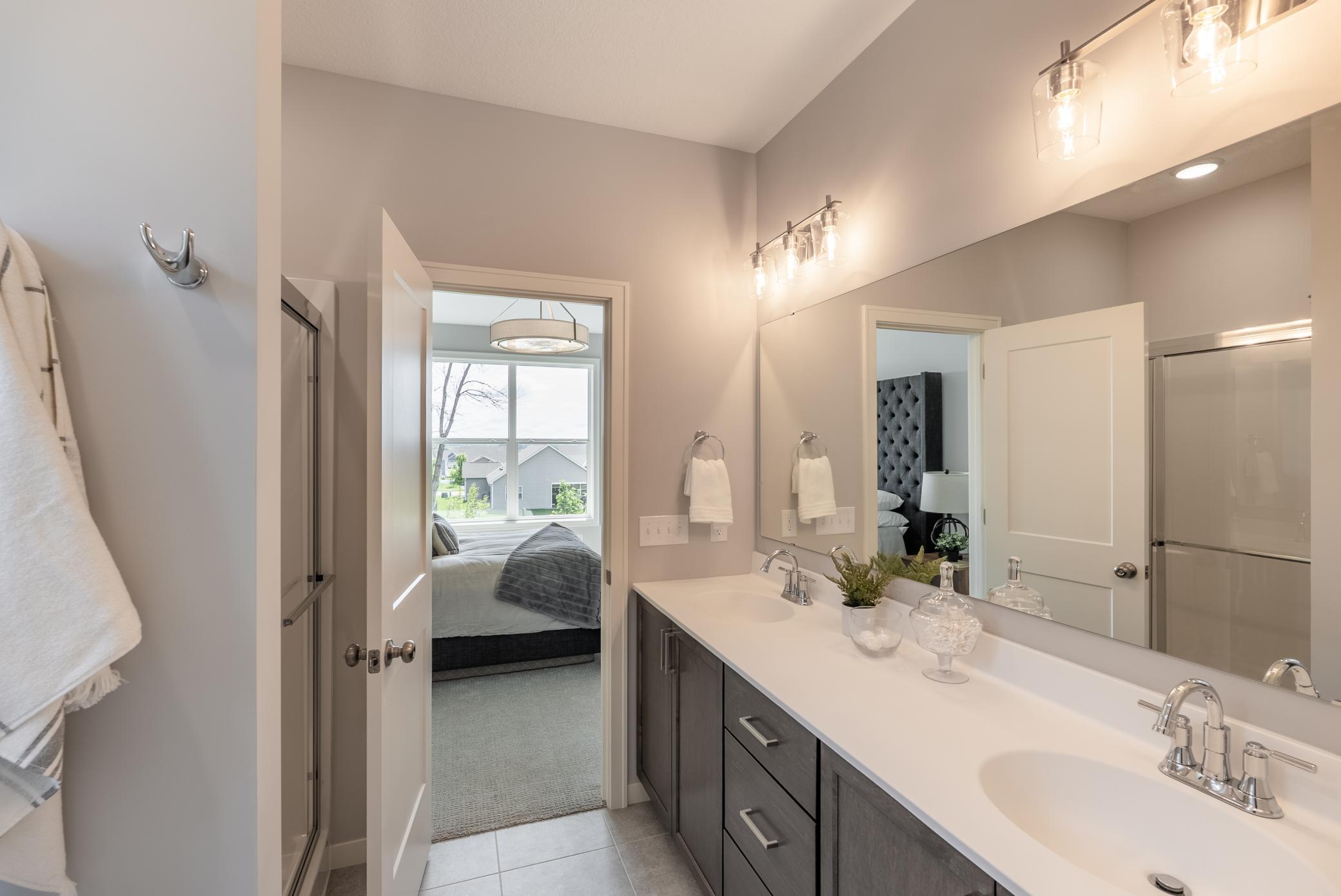 9117 62nd Street is under construction. These are photos of another model with the same floorplan.
