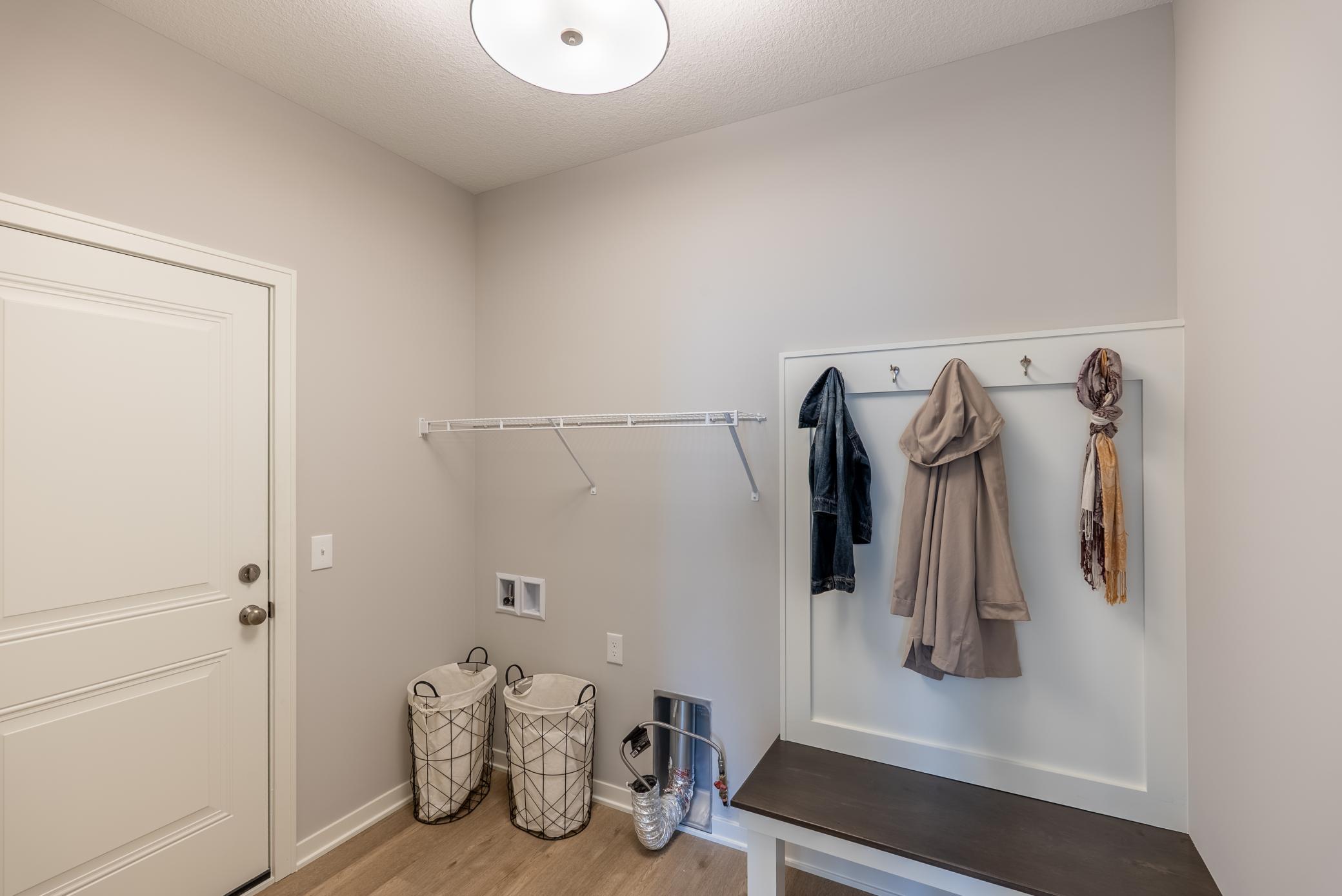 9117 62nd Street is under construction. These are photos of another model with the same floorplan.