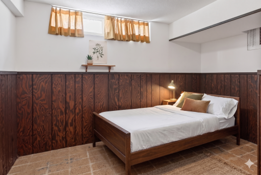 Lower level: bedroom 4 (non-conforming) virtually staged