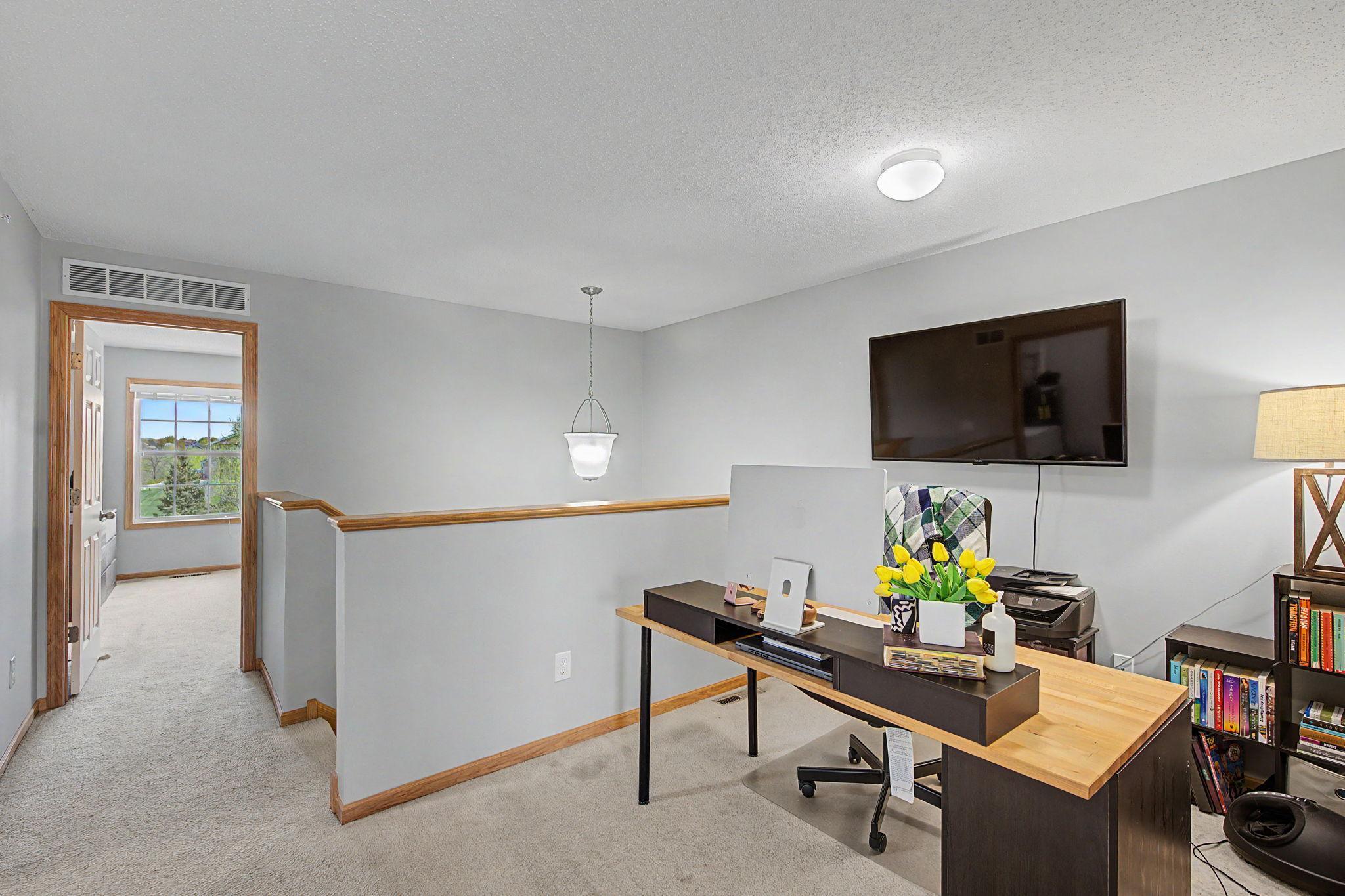 Upper level loft is conveniently located at the top of the staircase and central to the 3 bedrooms