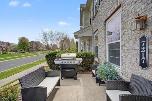 Front yard patio is a perfect space for grilling and entertaining