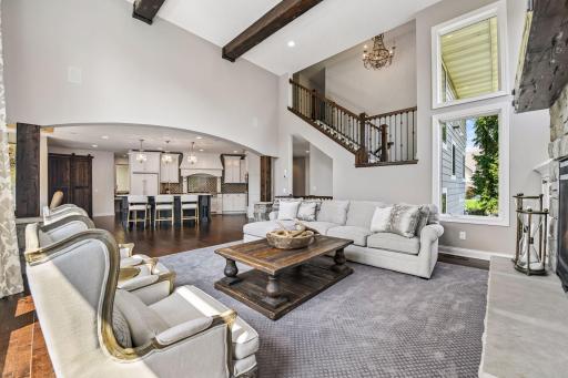 Corner view from main level living room to show archways, detail and flow to be a part of all the action in this beautiful turnkey home.