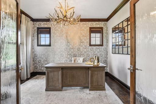 Main level front office awaits all your tasks to work from home in style.