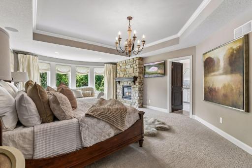 Primary suite is grand! Spacious with double sided fireplace with spa like bathroom.