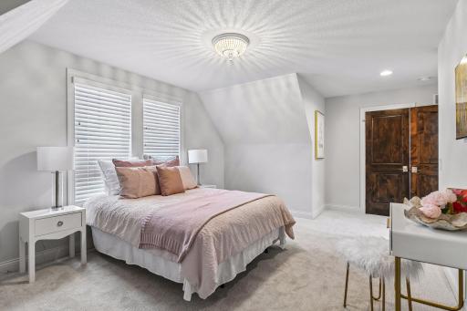 Bedroom has walk in closet as well. Solid core custom panel doors throughout home.