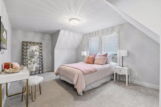 Second of four upper bedrooms with pass through bathroom.
