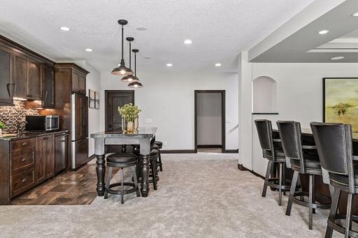 View towards utility room, 5th bedroom and 3/4th lower level bathroom.