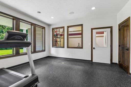 Your home gym routine and workout room awaits you! Door entrance to heated/AC sport court! WOW such an incredible space to HAVE FUN!!!!