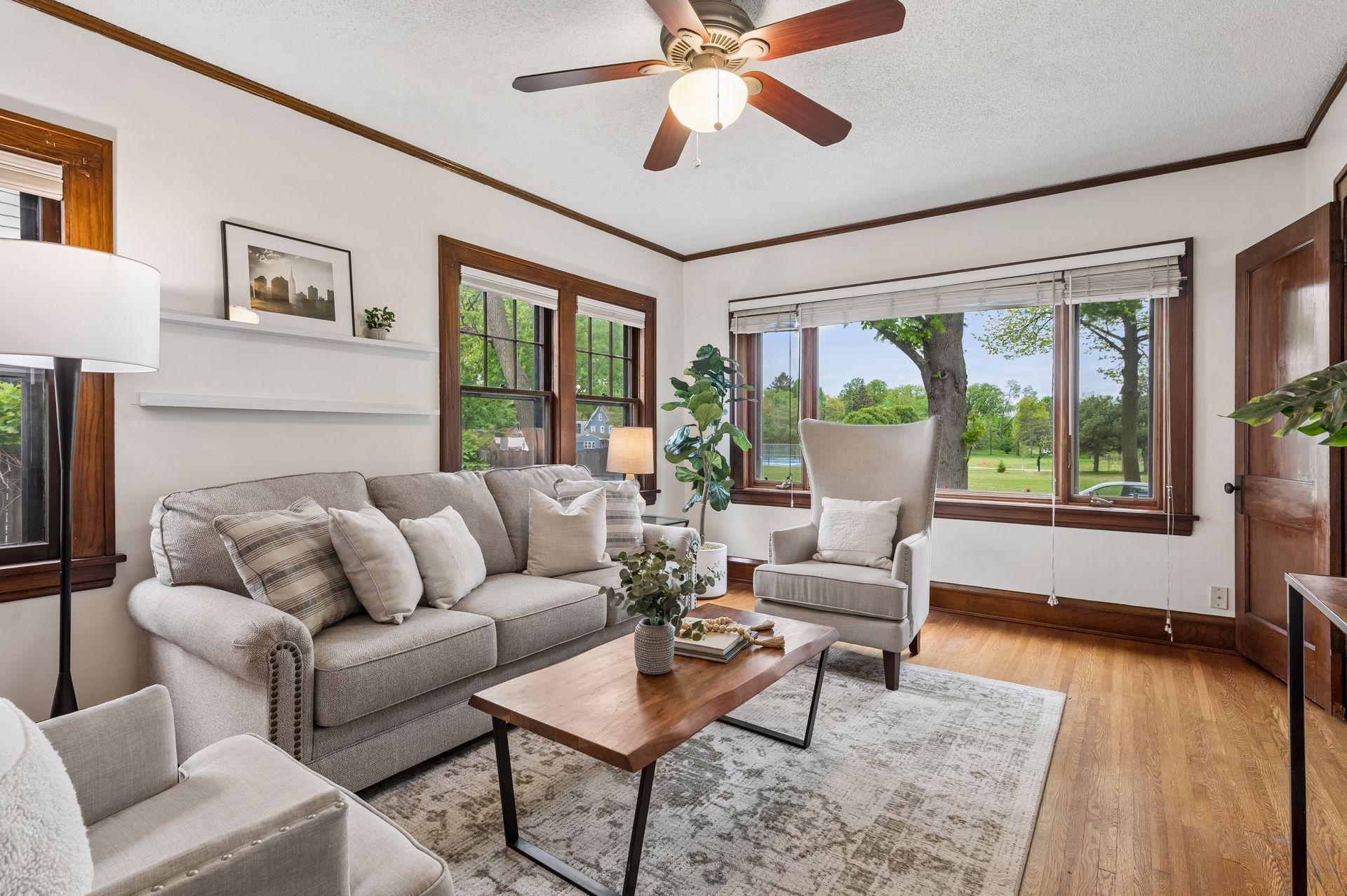 Bright livingroom with a picture window overlooking the park!
