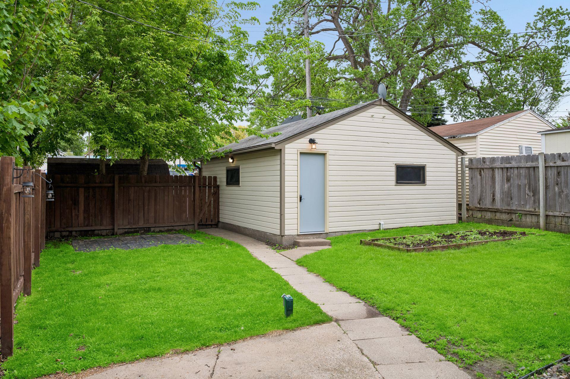 Fantastic yard for gardening and yard games!