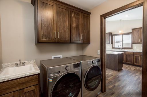 Laundry sink and large mud room closet for today's active lifestyle