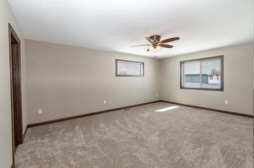 Spacious primary with big walk in closet and charming piano window for tons of light without sacrificing privacy_.jpg
