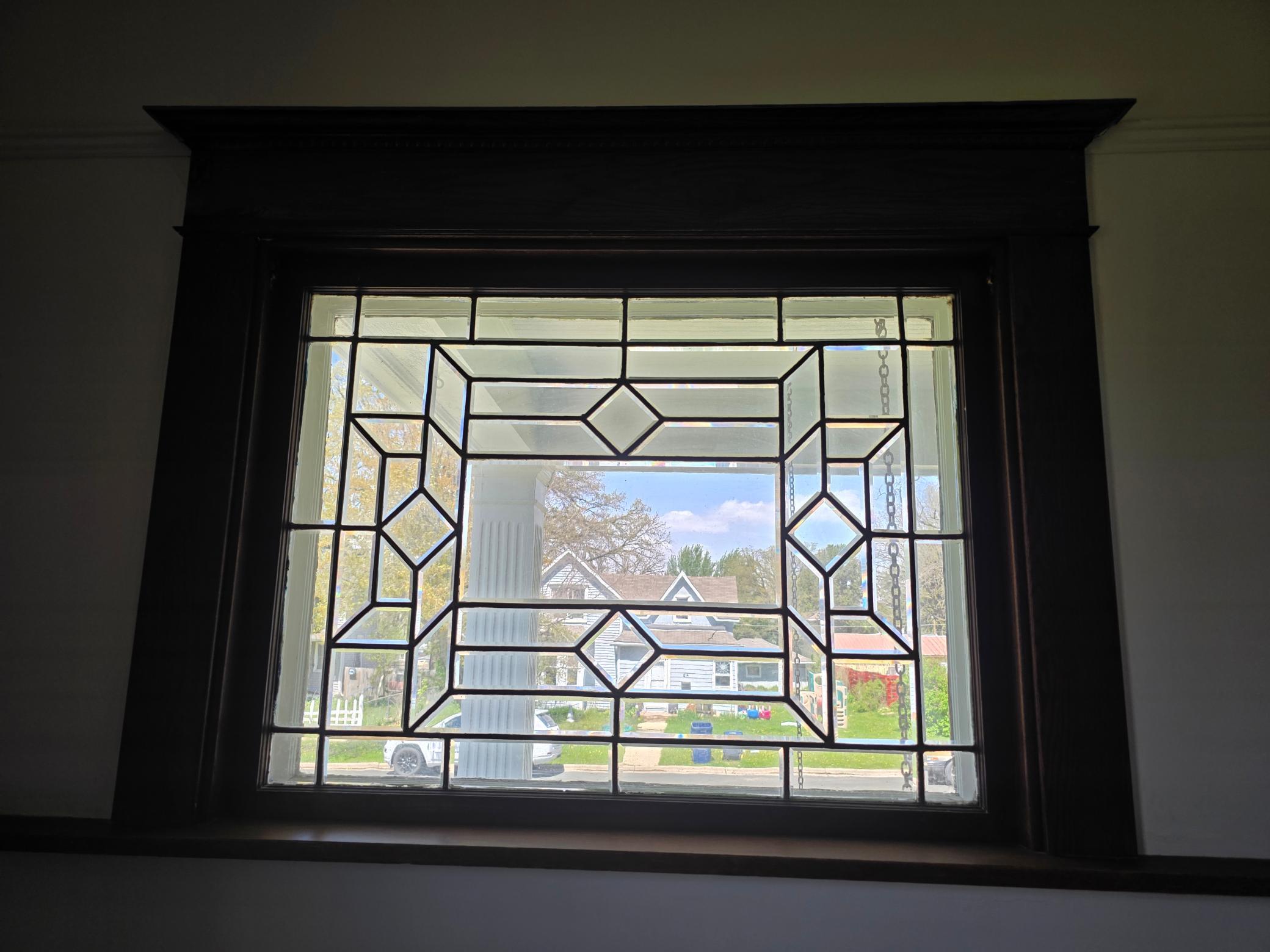 One of several leaded glass windows.