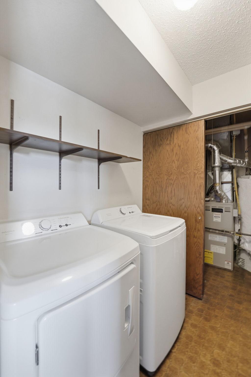 Convenient main level laundry doubles as a mechanical room.