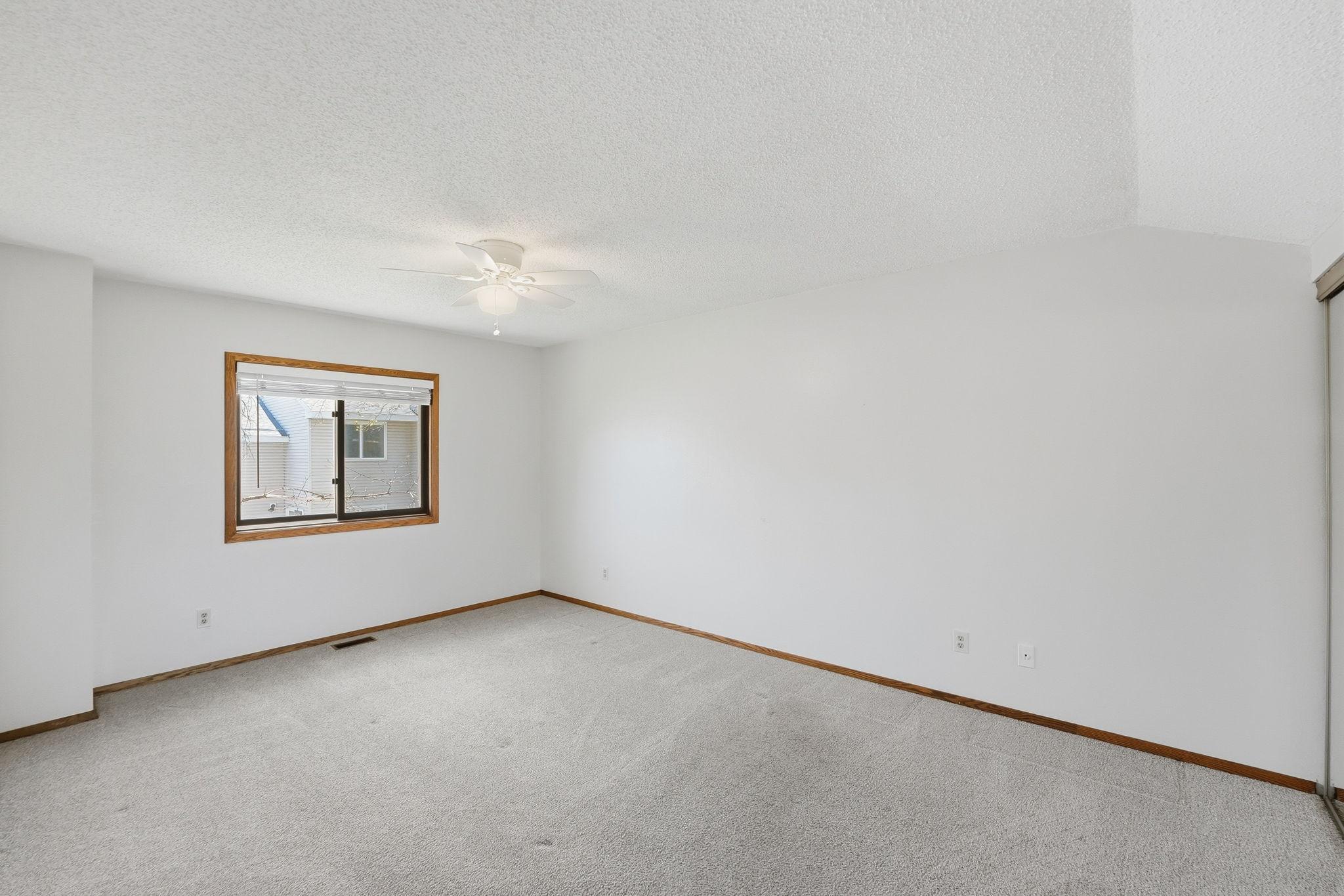 Customize this primary bedroom to be your own.