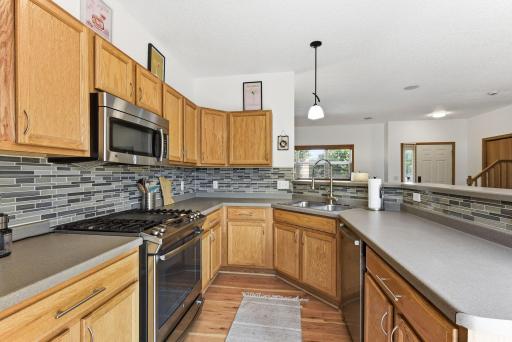 Loads of cupboard and counter space, stainless steel appliances and a gas range!