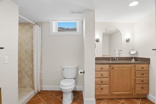 Spacious bathroom located on the lower level.