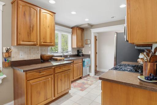 Updated kitchen with heated floors, granite countertops and stainless steel appliances.