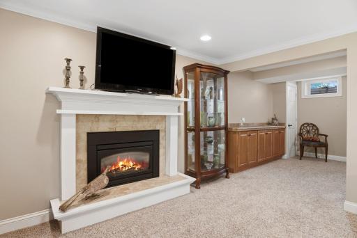Newer gas fireplace and drybar in the lower level.