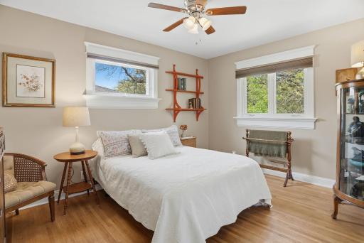 Spacious 2nd bedroom, notice the elevated woodwork throughout the home.