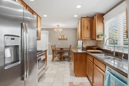 Functional layout with stainless steel appliances and plenty of cabinet storage.