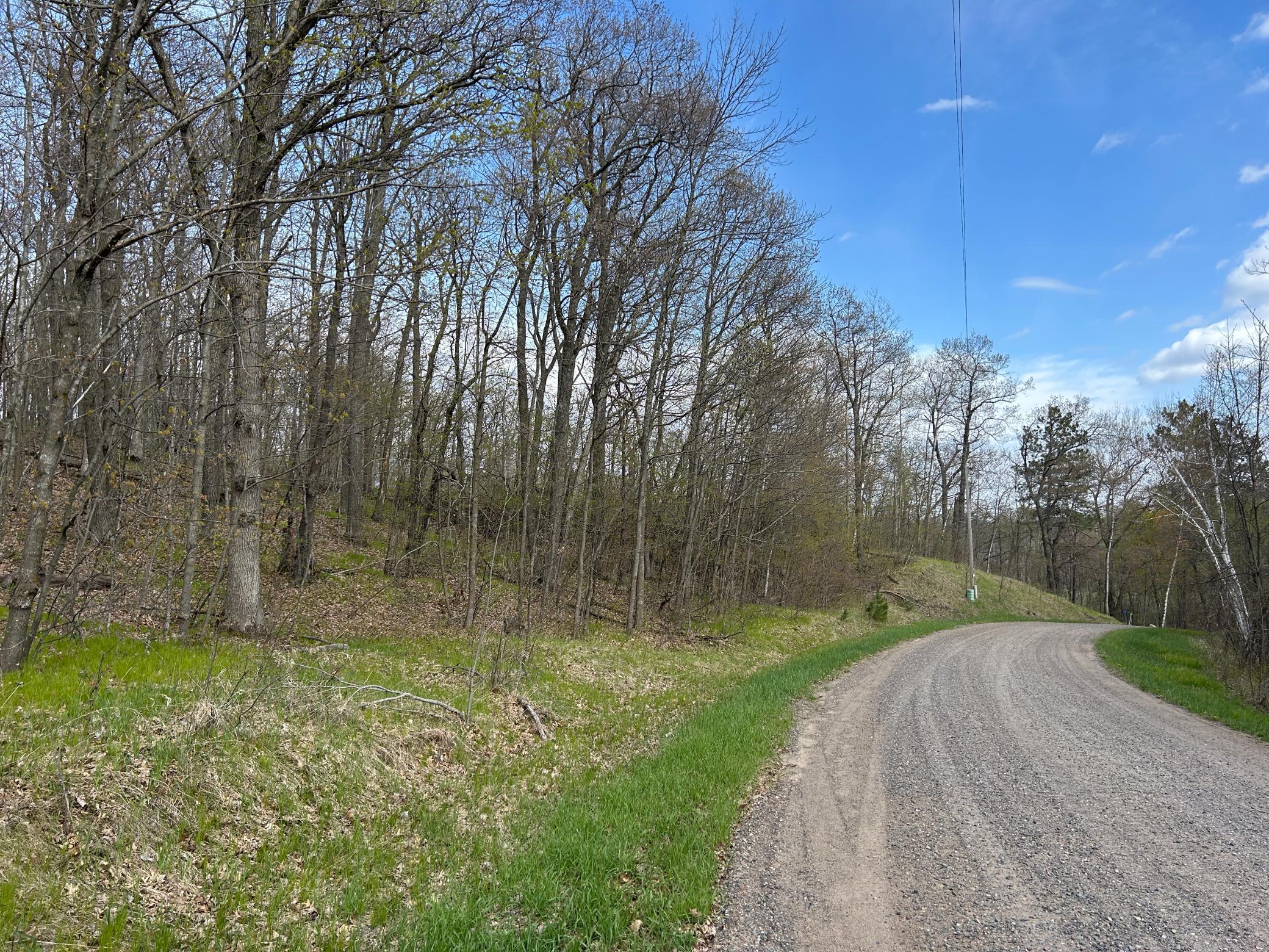 Looking down the road with the lot on the left side.