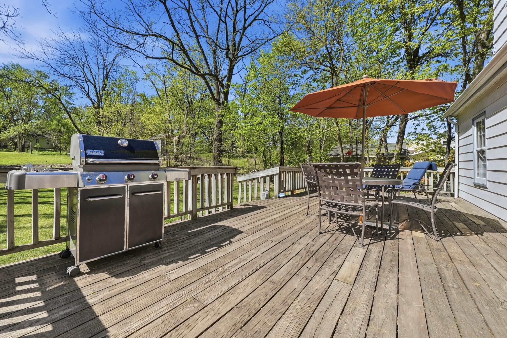 Large deck for entertaining or relaxing in your semi-private back yard