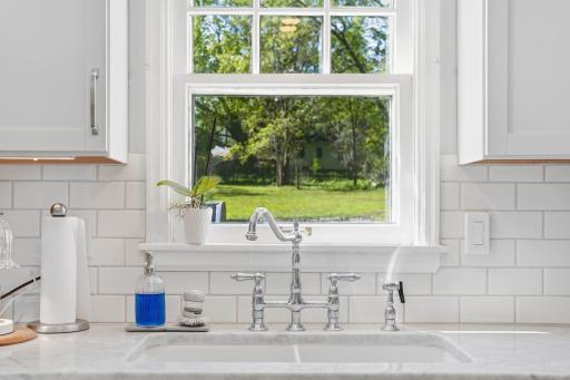 Kitchen window overlooking your deck and backyard