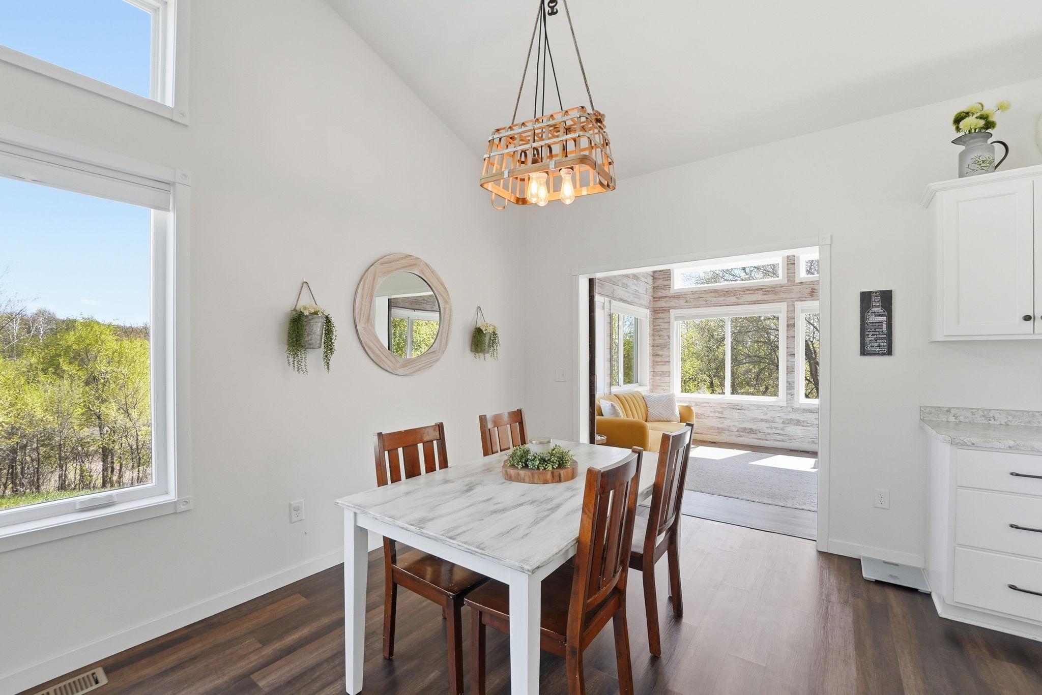 Off of the dining is a beautifully designed sun room.
