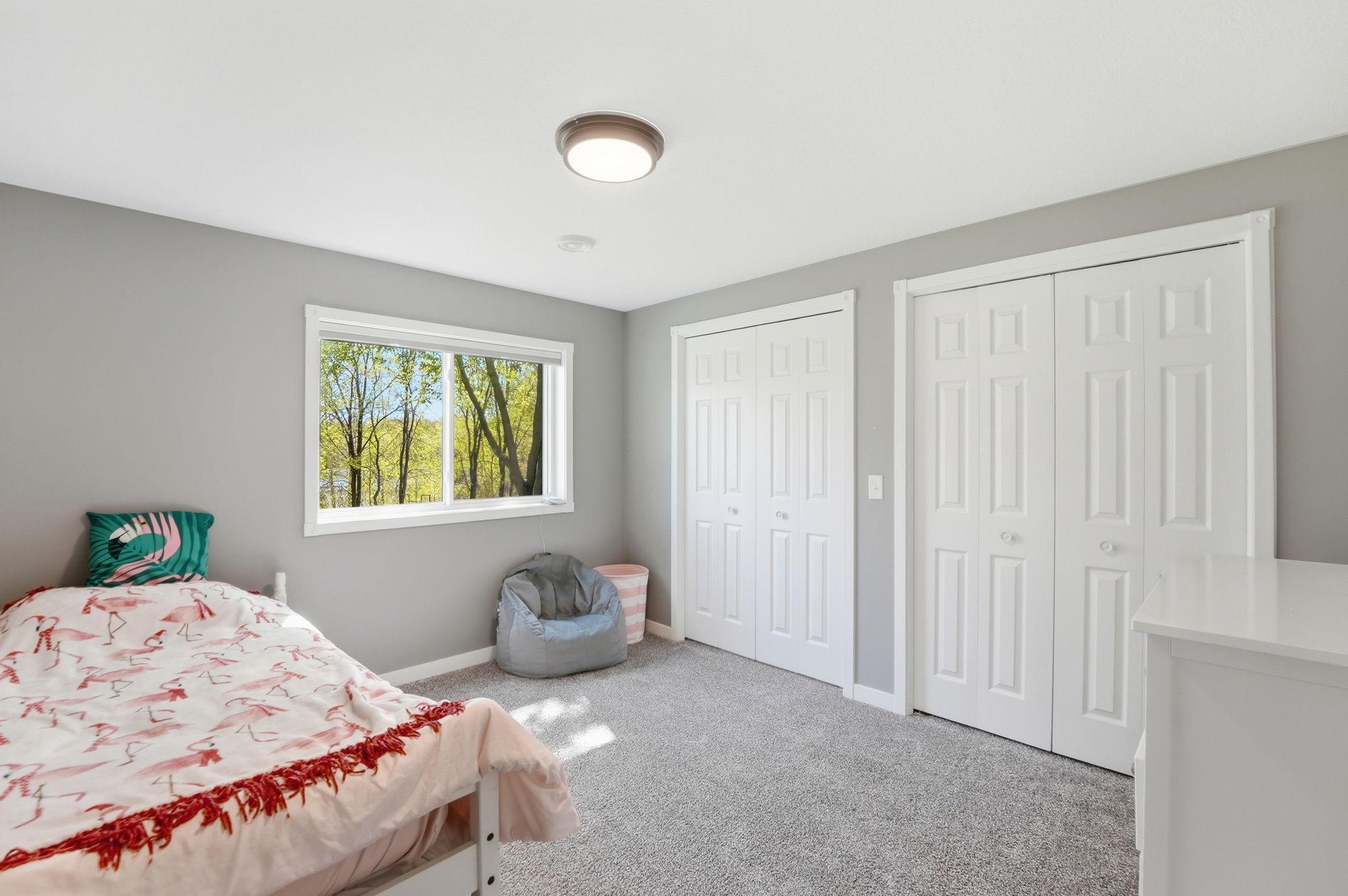 2nd bedroom with double the closet space.